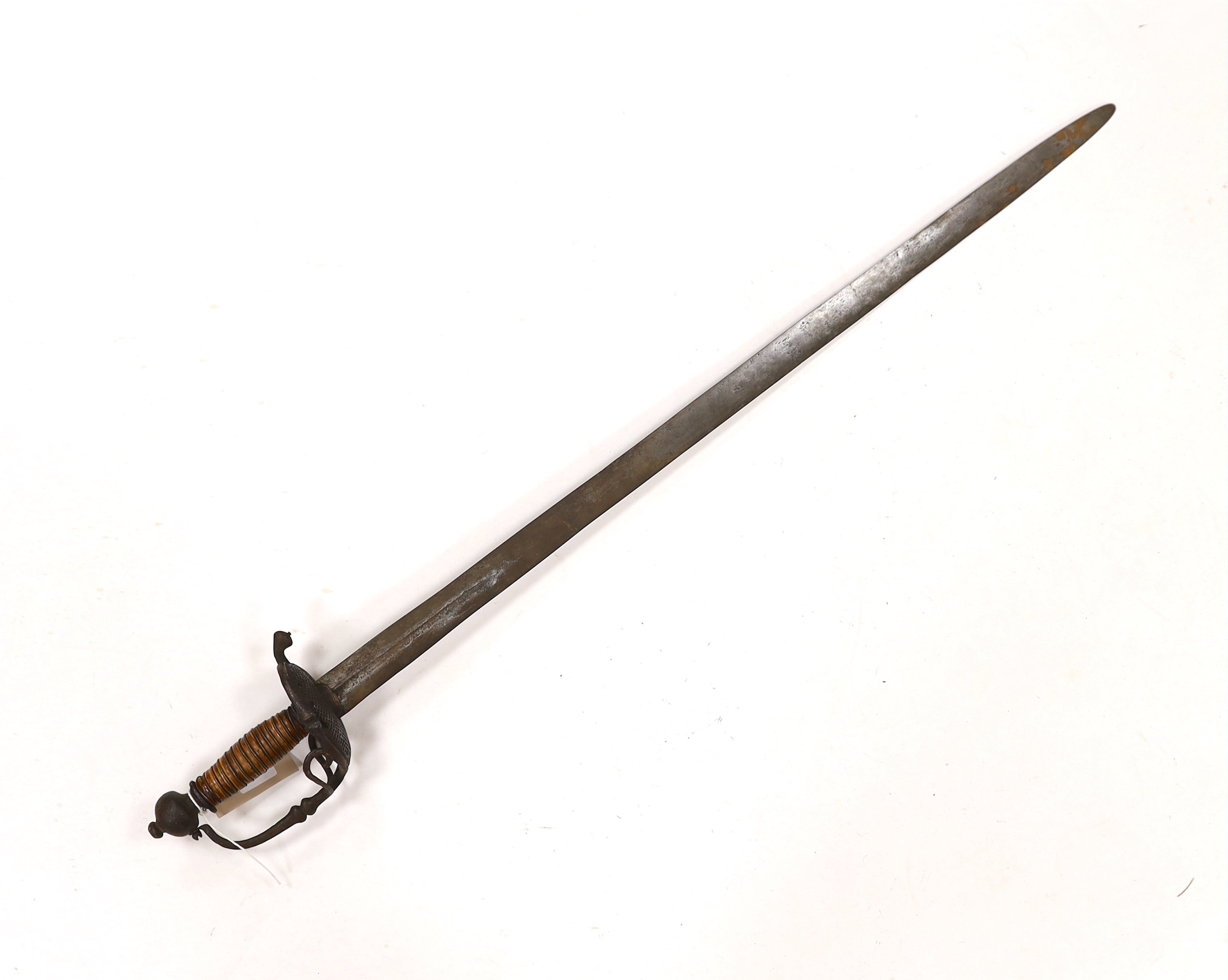 A 17th century Walloon-hilted small sword with pierced iron guard, replacement wooden grip and wide blade (possibly associated), blade 79cm